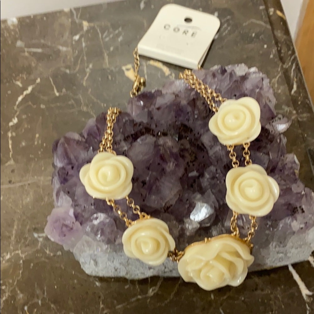 Flower necklace new with tag.